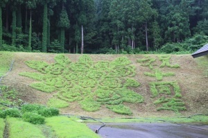 バラの花束の絵と祝十周年という文字が描き出された作品